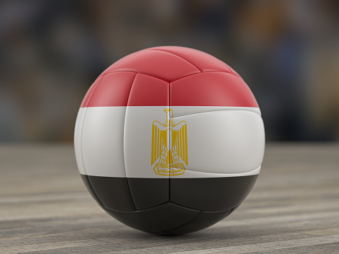 Volleyball ball Egypt flag on a wooden floor. 3d illustration.