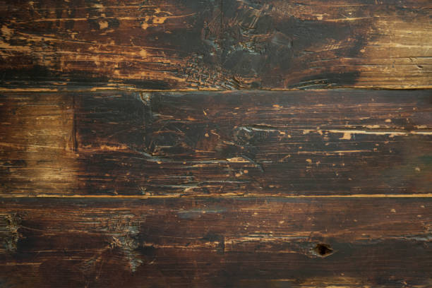 istock Surface of horizontal wooden brown boards with aging effect. 1491723857