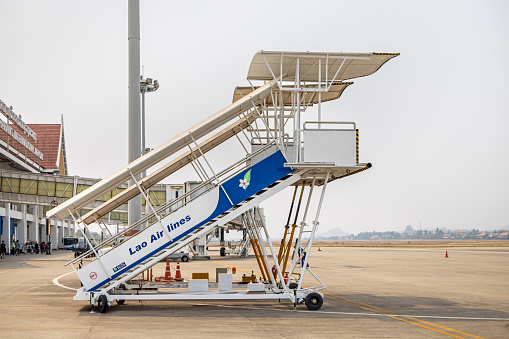 A massive cargo plane advances along the runway, showcasing its sheer size and power.