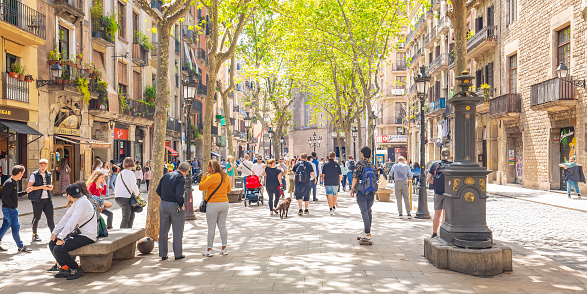 Crowded La Rampla shopping street in Barcelona, Spain.