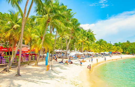 Singapore - 12 April, 2023: Tropical Palawan beach on Sentosa island