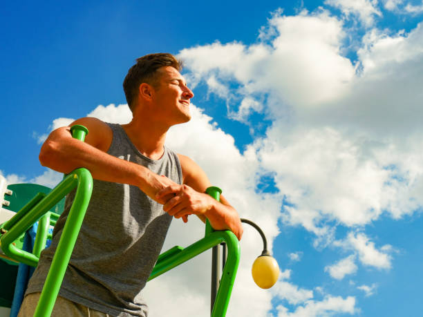 istock Young man relaxing after outdoor workout 1491737180
