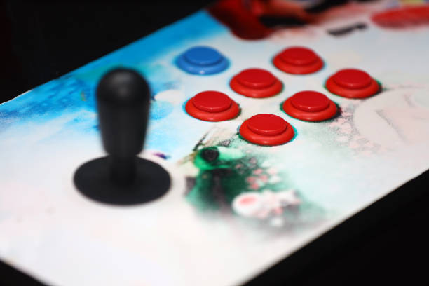 istock arcade table, buttons, gaming table, retro gaming, arcade gamin 1491740281