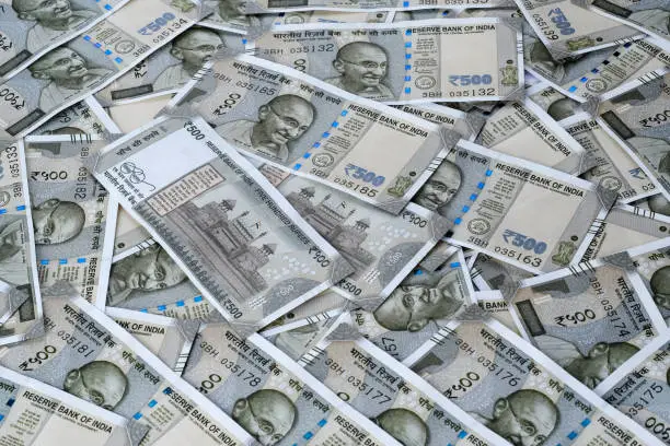 16 May 2023, Pune, India, Indian currency 500 rupees banknotes, business background India economy finance concept.