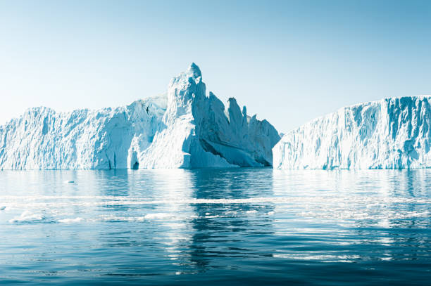 Big blue icebergs in Atlantic ocean, Ilulissat icefjord, Greenland. stock photo