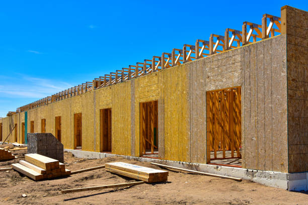 istock New wood frame and steel commercial building under construction. 1491753351