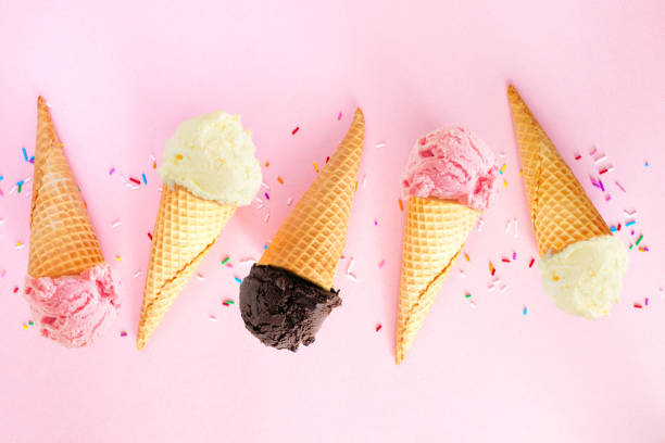 istock Ice cream cone flat lay over a pink background 1491757965