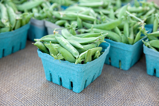 Box of green peas closeup