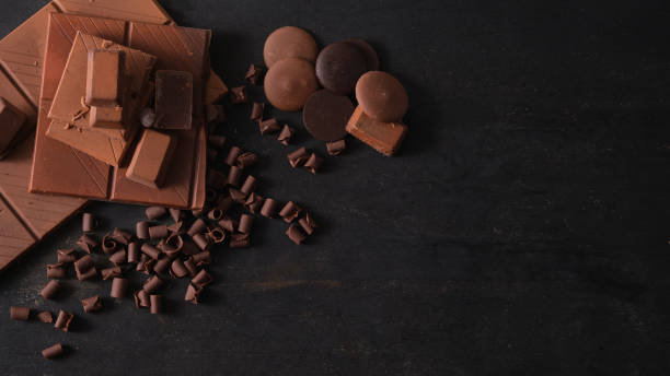 istock From above composition of assortment of fine chocolates on dark background with copy space. 1491763254