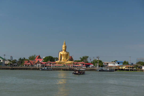 istock gold Buddha by Chao Phraya river at Wat Bang Chak, Nonthaburi 1491763577