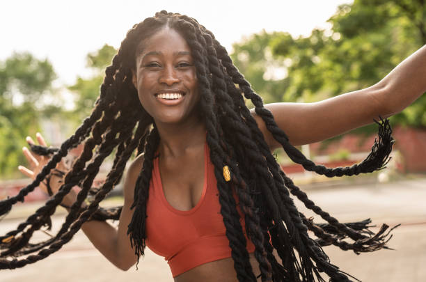 istock Smiling  African woman having just completed her daily workout. Her cheerful expression and enthusiastic attitude convey a sense of positivity. 1491765413