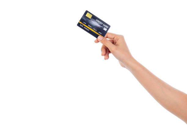 istock Hand holding credit card isolated on white background with clipping path. 1491768519