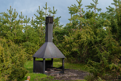 A public RMK Barbecue area in the middle of an Estonian forest. Kassari, Hiiumaa Island.