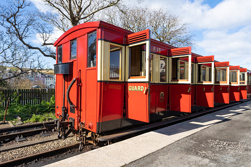 Port Erin, Isle of Man - 27 March 2023: carriages of the narrow-gauge steam railroad at the station in Port Erin