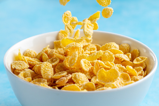 Yellow frosted corn flakes bowl for dry, cereals breakfast