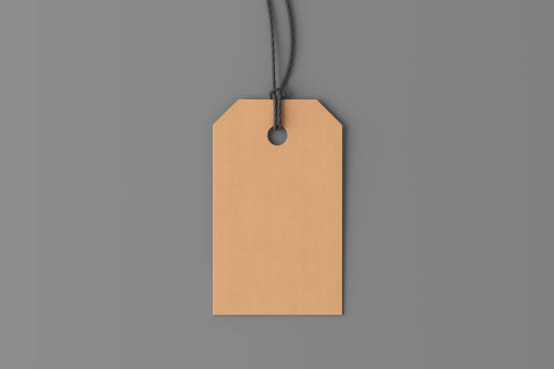 istock Cardboard tag mockup on gray background. View directly above 1491781525