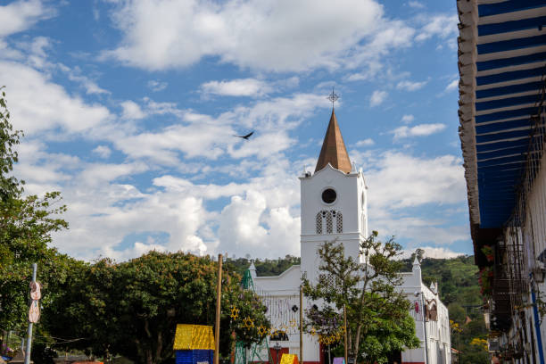 istock bell tower with a white tower in a town in Colombia 1491782250