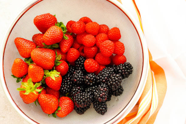Raspberry, blackberry and mint leaf  background.