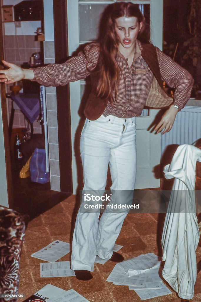 Dancing Young  woman in the 1970's Dancig Young woman getting her Driver's License , back in the 1970's Party - Social Event Stock Photo