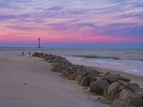 This is a photograph of a lighthouse off Folly Island near Charleston, South Carolina.