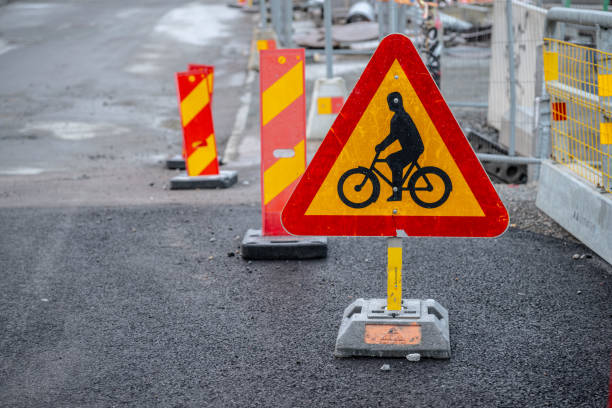 Gothenburg, Sweden - April 06 2023: Bicyclist warning sign by road works.