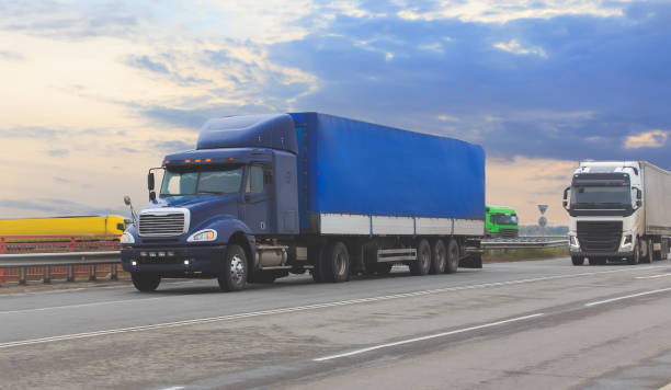 istock Trucks goes on the highway 1491793540
