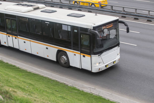 istock Bus moves along the street 1491793640