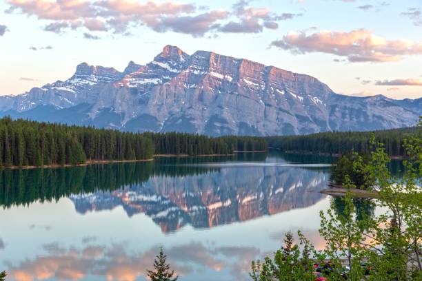 istock Rundle Mountain Peak Reflected in Calm Water of Two Jack Lake 1491804298