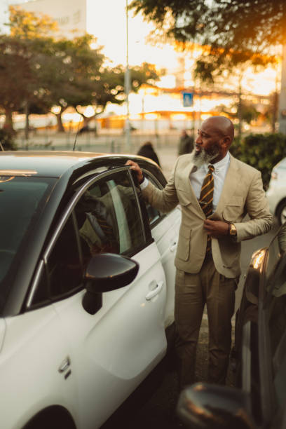 istock A Black Gentleman by his Car 1491812829