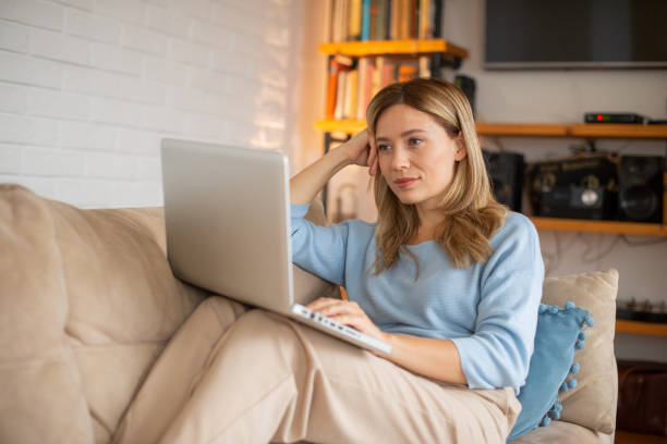 istock Young fashionable woman working at home 1491822049