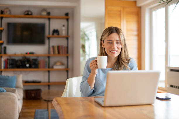 istock Young woman working from home 1491822058