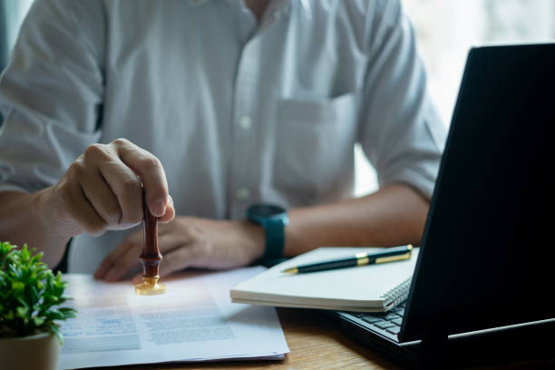 istock Approved stamp certificate document, symbolizing success and accomplishment. Contract law or paper work business and finance document rubber stamp. investment contracts, real estate documents. 1491822316