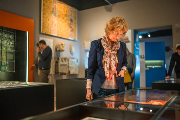 istock Senior Female Museum Visitor 1491823774