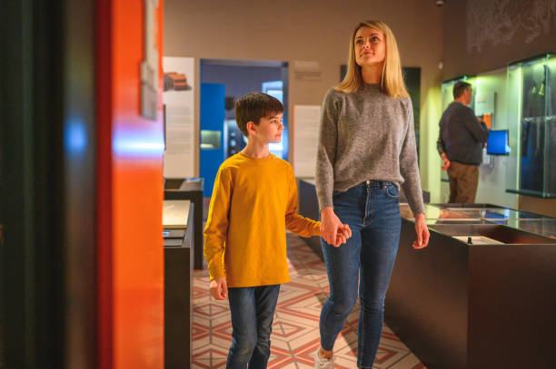 istock Mother and Son Strolling Through the Museum 1491823783