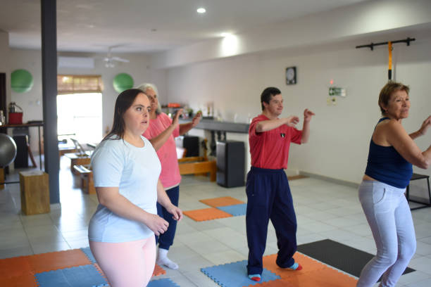 istock people doing zumba in a room 1491829637