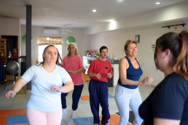 istock people doing zumba in a room 1491829641