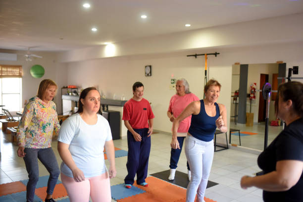 istock people doing zumba in a room 1491829685