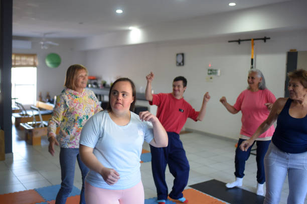 istock people doing zumba in a room 1491829717