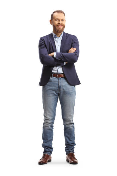 istock Young man in jeans and suit standing with folded arms and smiling 1491829848