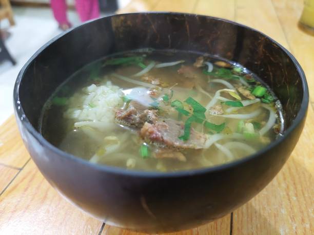 istock meat & vegetable soup in a coconut shell bowl 1491834512