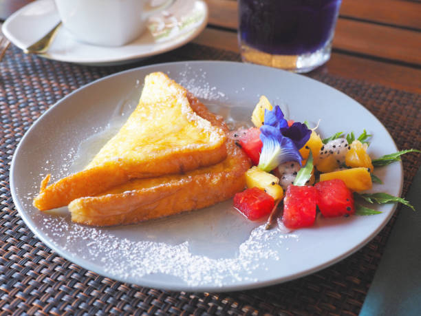 honey bread toasted and fruit salad for breakfast.