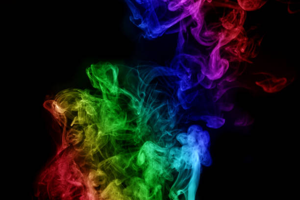 istock Abstract smoke isolated on black background,Rainbow powder 1491854285