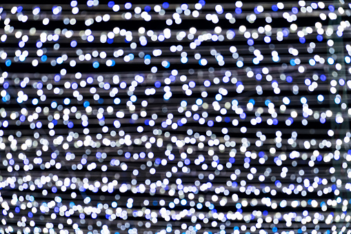 White blue bokeh lights of Christmas lights and New year