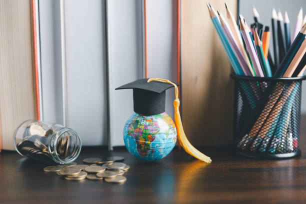 istock Graduation cap with Earth globe. Concept of global business study, abroad educational, Back to School. Education in Global world, Study abroad business in universities in worldwide. language study 1491862509