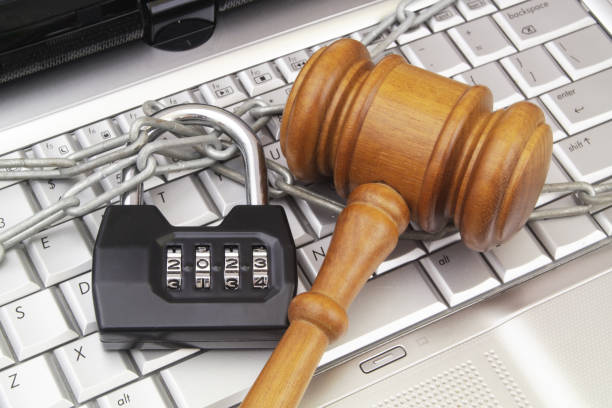 istock Judge gavel, padlock with numbers 2023 and chain on computer keyboard. 1491868935