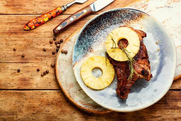 Roasted meat with pineapple. stock photo