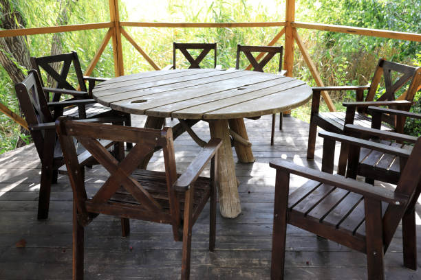 istock Wooden table and chairs on terrace 1491873523