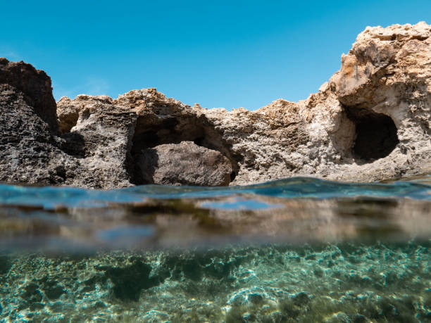 istock Blue sky, sea caves and emerald sea 1491873526