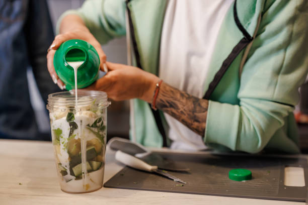 istock Mature couple preparing healthy smoothie in kitchen 1491881558