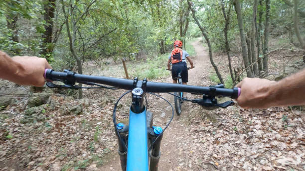 istock First person perspective following female biker ahead 1491891141